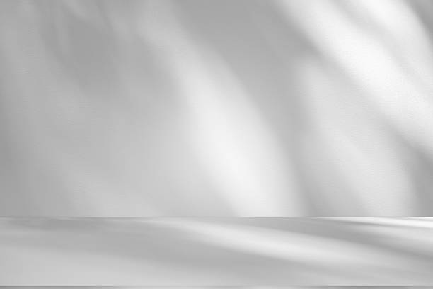 istock Wall interior background, studio and backdrops show products.with shadow from window color white . background for text insertion and presentation product 2225302723