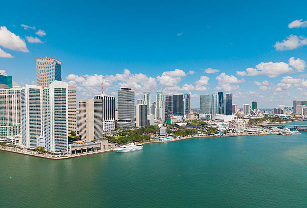 istock Panoramic modern architecture in Miami downtown, Florida. Miami skyline panoramic view. Aerial view of cityscape with skyscraper in Brickell Key, United States. Downtown Brickell Miami 2225303693