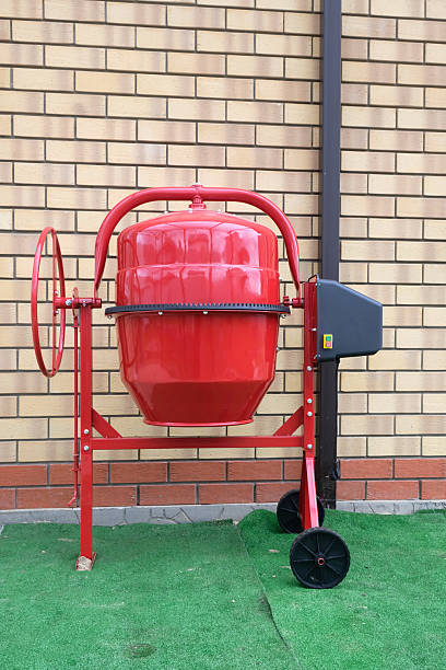 istock New red concrete mixer, general view. Construction tool for preparing concrete mix. 2225307994