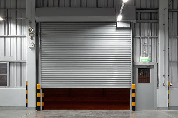 istock Shutter door in factory warehouse suit for industrial background. 2225309577