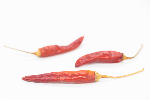 Red peppers threaded onto a string