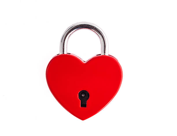istock Red heart shaped padlock on white background 2225310995