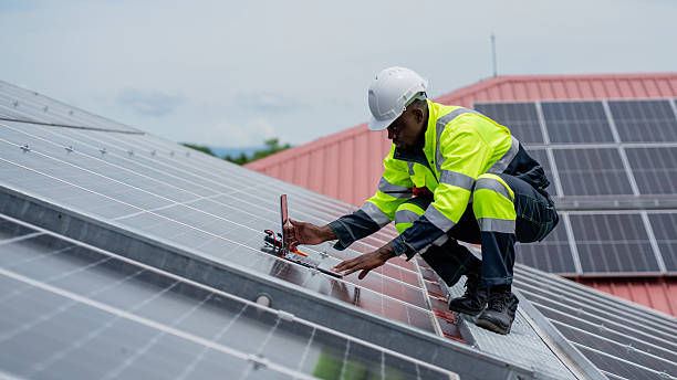 istock Service engineer checking solar cell on the roof for maintenance if there is a damaged part. Engineer worker install solar panel. Clean energy concept. 2225311751