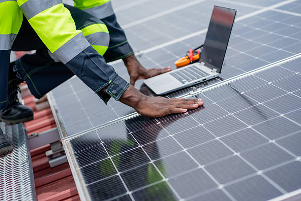 istock Service engineer checking solar cell on the roof for maintenance if there is a damaged part. Engineer worker install solar panel. Clean energy concept. 2225311921