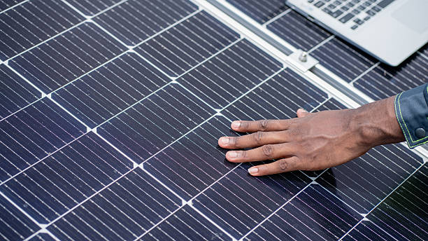 istock Service engineer checking solar cell on the roof for maintenance if there is a damaged part. Engineer worker install solar panel. Clean energy concept. 2225311955