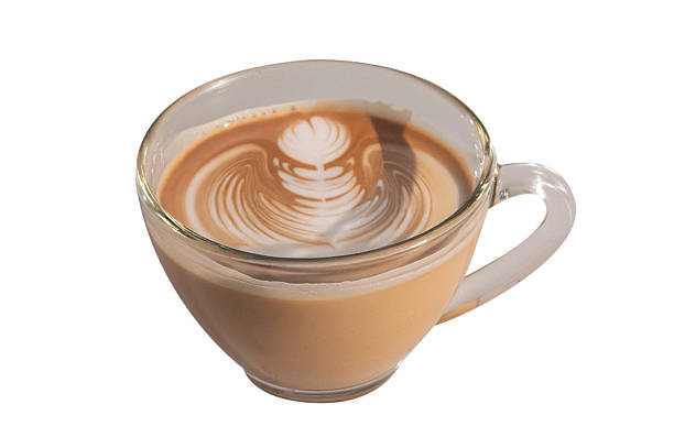 istock A clear glass cup filled with a creamy latte, topped with a delicate leaf-shaped foam design, isolated on white background 2225312964