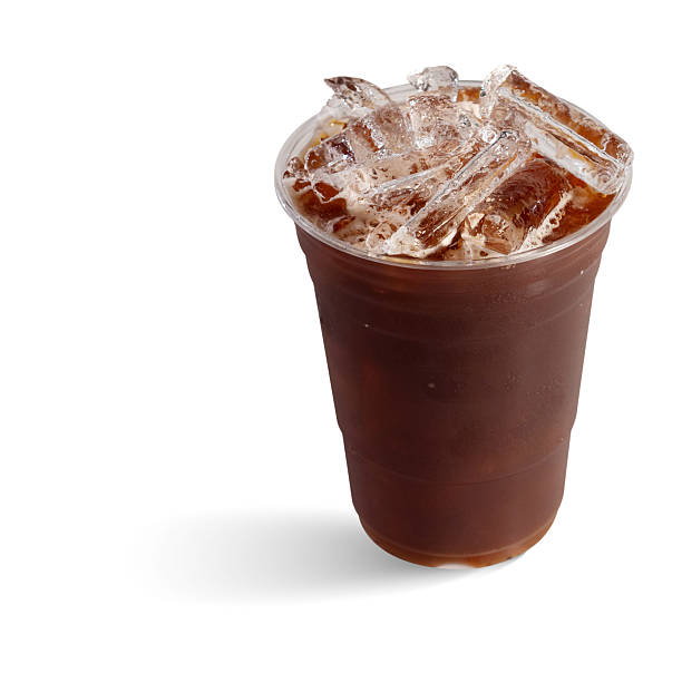 istock Iced black coffee in plastic cup on white 2225313024