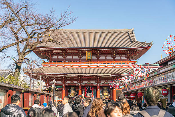 Tokyo, Japan - January 20, 2025: Sensoji or Asakusa Kannon Temple, is a Buddhist temple located in Asakusa dedicated to the bodhisattva Kannon is Tokyo's oldest temple, and one of its most significant. People can be seen in front of the temple and taking photos.