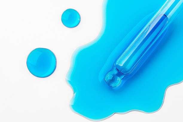 istock Drops of cosmetics and a pipette on a white background. 2225315553