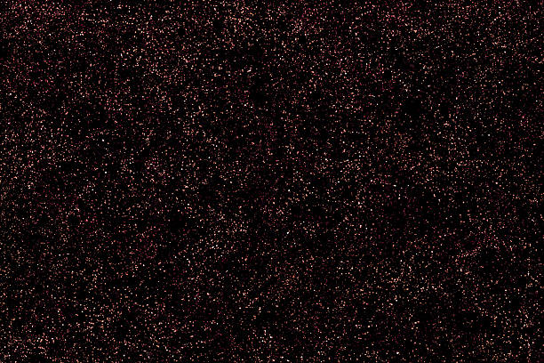 Abstract red brown galaxy space background. Starry night sky. Photo can be used for Christmas, New Year and all celebrations background concepts.