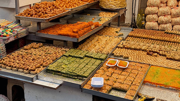 istock Savoring traditional sweets in Baghdads lively market 2225320508