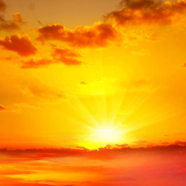 istock Full frame orange color sunset sky with sunbeam background 2225320825