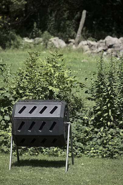 istock Compost Spinner In A Green Grass Field 2225325017
