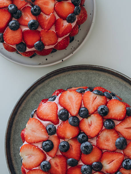 istock Homemade birthday cakes with berry decor 2225327622