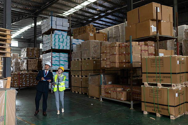 istock An Asian male manager and a logistic engineer discussed over a tablet computer to audit and improve the warehouse's operations and workflow for increased customer satisfaction growth. 2225329274