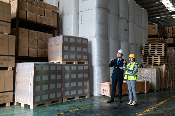 istock An Asian male manager and a logistic engineer discussed over a tablet computer to audit and improve the warehouse's operations and workflow for increased customer satisfaction growth. 2225329357