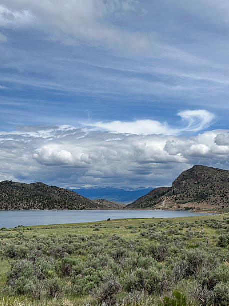 istock Desert Lake with Dramatic Clouds and Mountain View.  Ruby Reservoir and Tobacco Root Mountains 2225332869