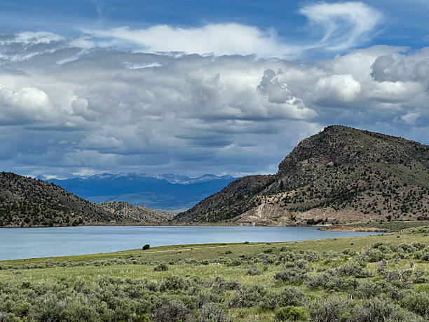istock Desert Lake with Dramatic Clouds and Mountain View.  Ruby Reservoir and Tobacco Root Mountains 2225332870