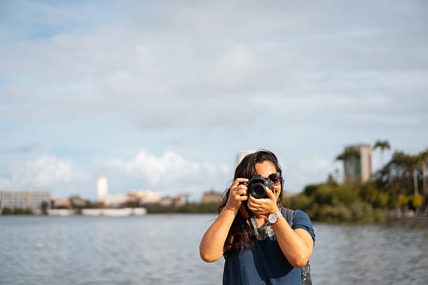 istock Photographer on the Capibaribe River 2225337423