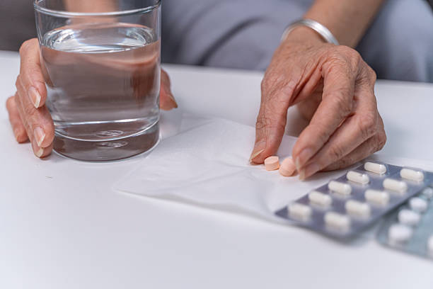 istock Senior Woman Preparing Medication 2225344373