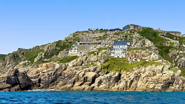 View of the rocky Cornish theatre from the sea