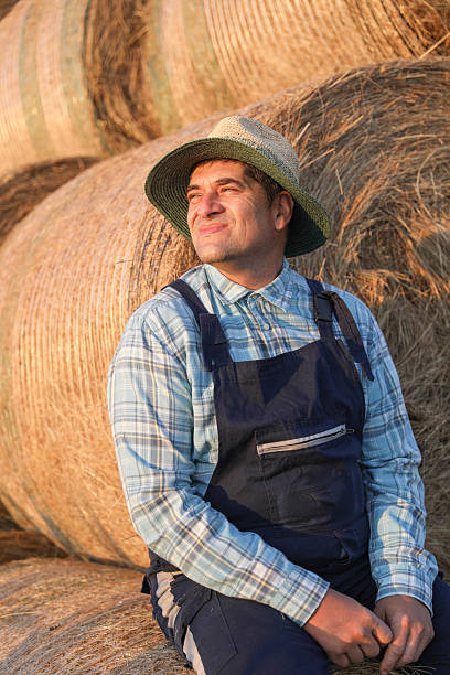 istock Farmer Posing With Arms Crossed On Farm 2225348694