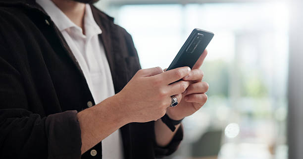 istock Hands, office and business man with phone for networking, typing text or social media marketer online. Mobile, startup and creative worker check email, campaign or brand promotion on platform closeup 2225349313