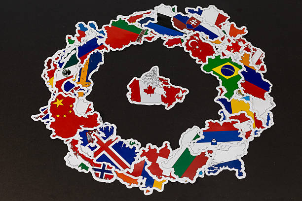 istock Canada Surrounded by World Flags in Country Shape Stickers on Black Background 2225351634