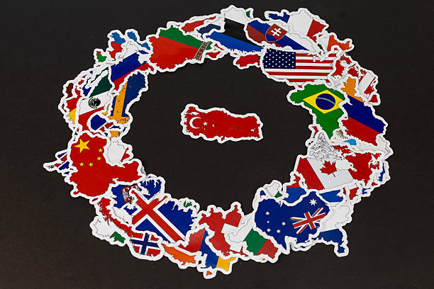 istock Turkey Map Surrounded by International Flag Stickers on Black Background 2225351636