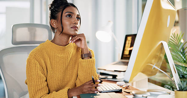 istock Thinking, computer and business woman in office for insight, inspiration or planning decision. Startup, vision and creative worker with thoughts for mindset, ponder or reflection for problem solving 2225352052