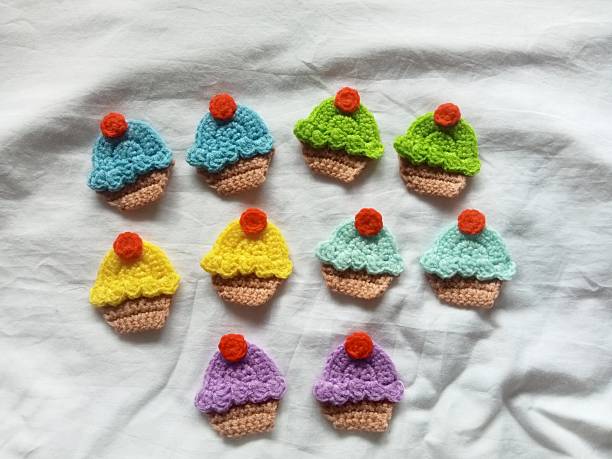Handmade crochet cupcake for decoration, illustration, background texture