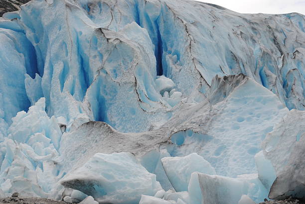 istock Majestic Blue Glacier Ice Formation with Rugged Textures 2225354729
