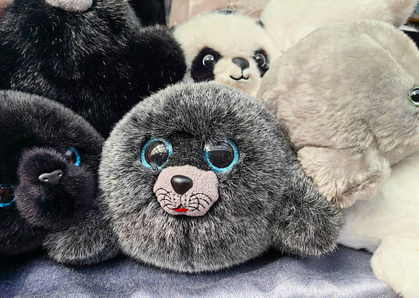istock stuffed animals in various poses showcasing adorable features in cozy display setting. closeup. 2225358944