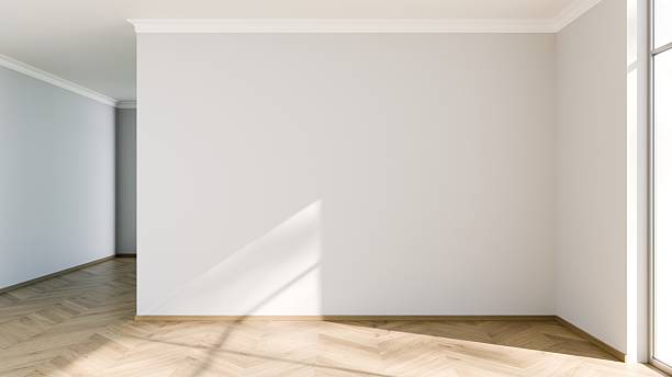 istock A bright and spacious empty room features large windows allowing natural light to flood in. The wooden flooring complements the minimalist style, perfect for various interior designs. 3d render 2225359014