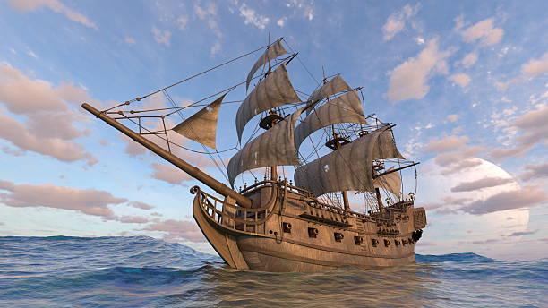 istock A majestic sailing ship with towering sails cuts through the ocean waves as the sun sets on the horizon. The sky displays beautiful hues with scattered clouds, creating a serene atmosphere. 3d render 2225359034