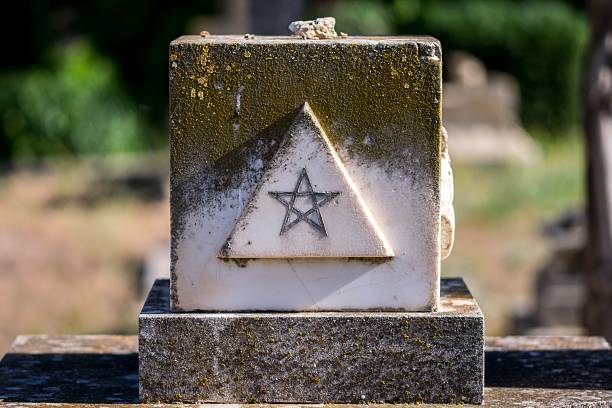 Vandalism in old cemetery.