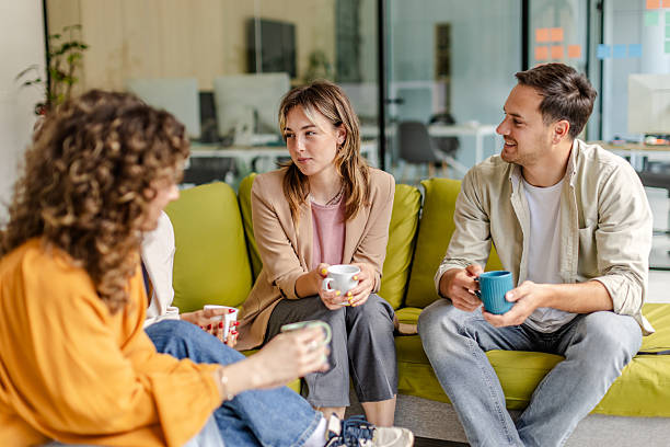 istock Collaboration among colleagues in a modern office setting during a casual team meeting 2225362303