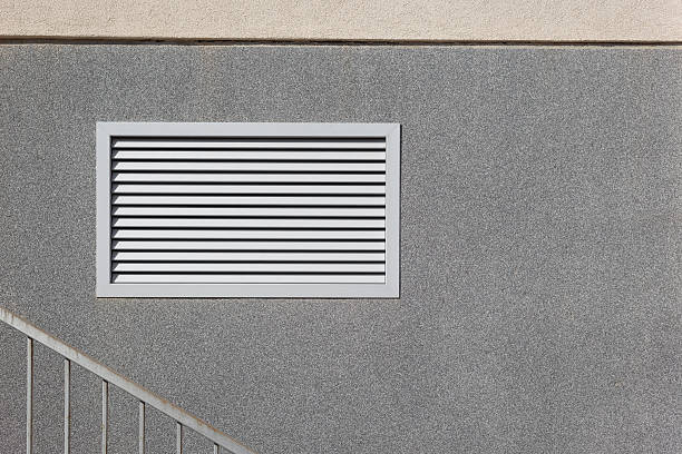 istock copy space wall architecture background outdoors mock up concrete wall. Empty gray wall geometric template background 2225363783