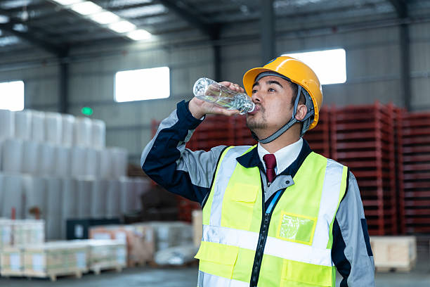 istock Asian Male Warehouse worker drinking water 2225363926