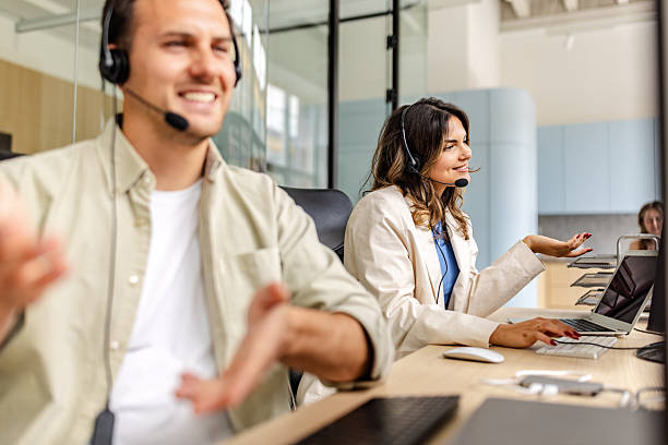istock Colleagues collaborating at a modern office workspace during a team meeting 2225364108