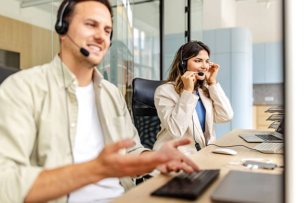 istock Colleagues engage in productive teamwork during a business meeting in a modern office setting 2225365467