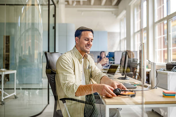 istock Effective teamwork fostered in a modern office environment during a busy workday 2225366163