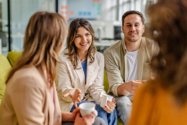 istock Engaged team members collaborating in a modern office space during a productive meeting 2225367058