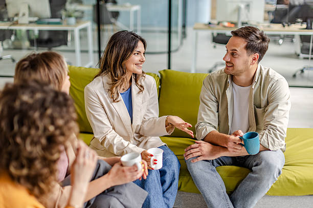 istock Engaged teamwork discussion among colleagues in modern office setting promoting collaboration and creativity 2225367500