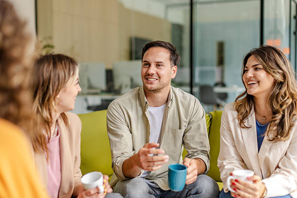 istock Engaging team members discuss ideas and collaborate during a meeting in a modern office setting 2225368999