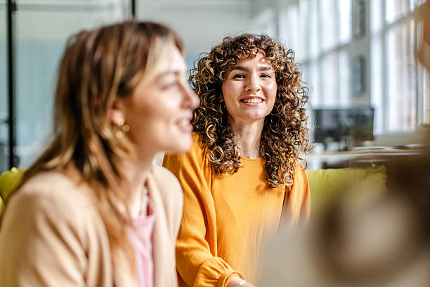 istock Engaging teamwork in a modern office setting with professional adults collaborating effectively 2225369554