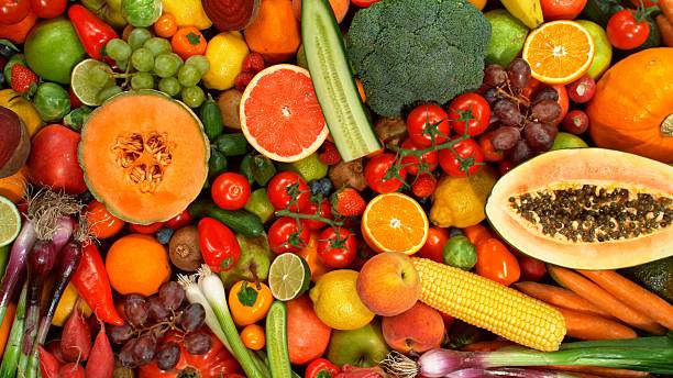 istock Different Types of Fresh Fruit and Vegetables on a Pile 2225370632