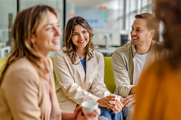 istock Office teamwork fosters collaboration among colleagues in a modern workspace during a casual meeting 2225370666
