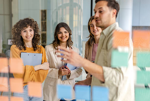 istock Team collaboration in a modern office setting during a brainstorming session with diverse employees discussing ideas and strategies 2225372688
