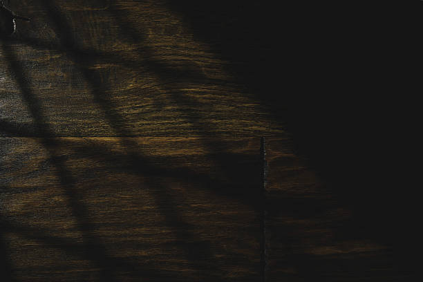 istock Wooden surface with natural patterns and subtle shadows in warm lighting 2225373435